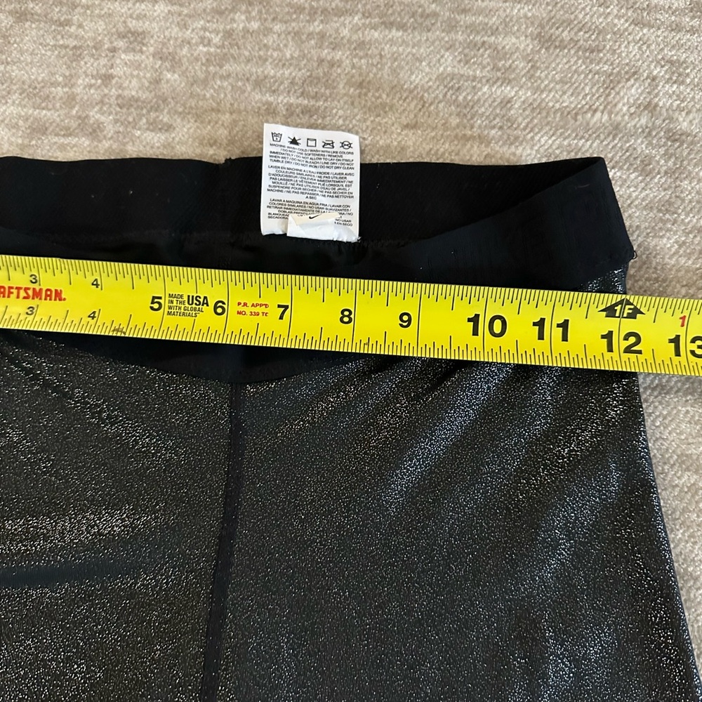 Lot of 2: Nike, glitter leggings w/leg logo. One silver, one gold. Both sz med - Picture 6 of 9